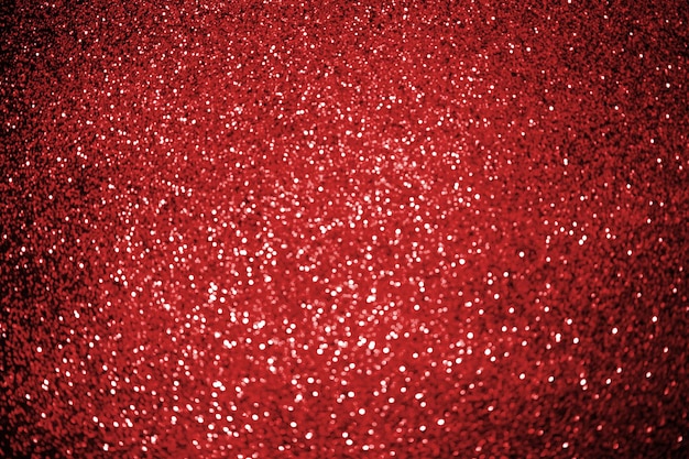 fond abstrait avec un décor de paillettes rouge brillant