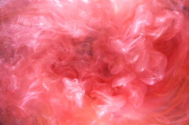 Fond abstrait d'encre rouge Toile de fond de peinture acrylique pour les cosmétiques de narguilé de parfum Nuages de fumée mystérieux brouillard coloré