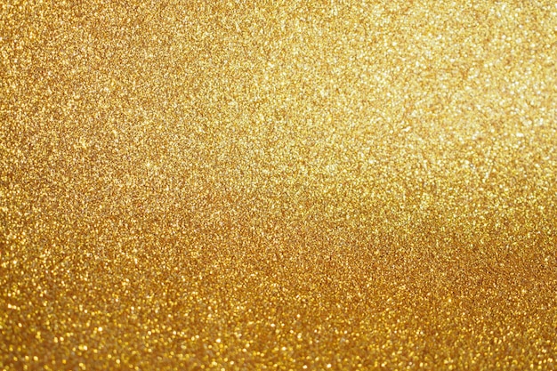 Fond abstrait scintillant de paillettes d'or