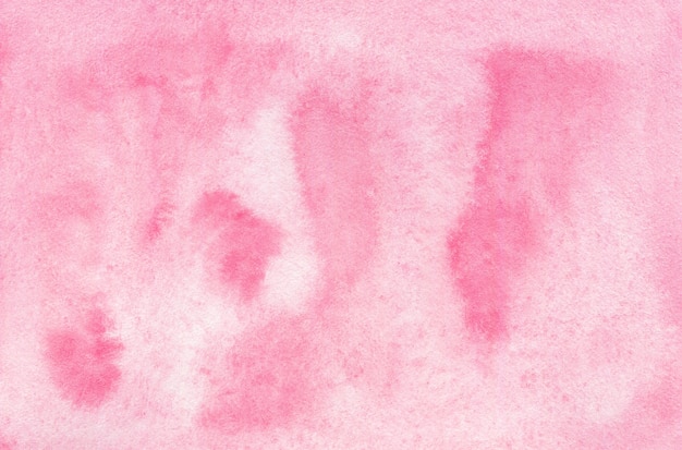 Fond aquarelle abstrait rose sur papier texturé