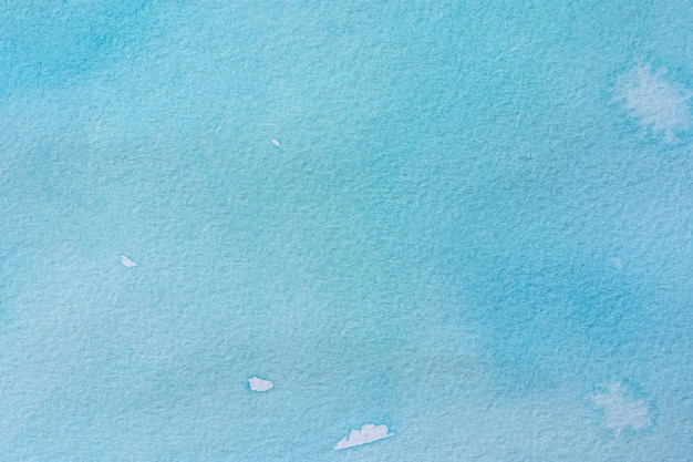 Fond aquarelle bleu mer. Abstrait pastel du ciel ou de l'eau. La texture du papier coloré pour un design moderne. Mouvements flous bleus, dessin aquarelle transparent. Bannière d'été