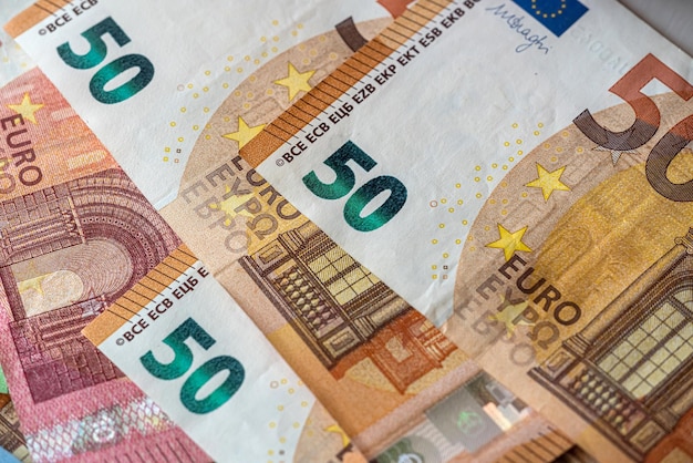 Fond d'argent économique des billets en euros lumineux