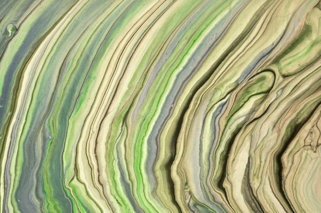 Fond d'art fluide abstrait couleurs vert clair et beige. Marbre liquide. Peinture acrylique avec dégradé olive.