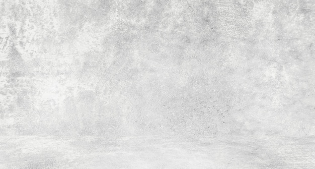 Fond blanc grungy de ciment naturel ou de texture ancienne en pierre comme mur de motif rétro. Bannière murale conceptuelle, grunge, matériel ou construction.