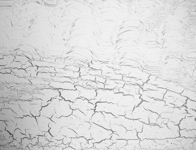 Fond blanc vintage ou grungy de texture ancienne de mur de ciment ou de pierre