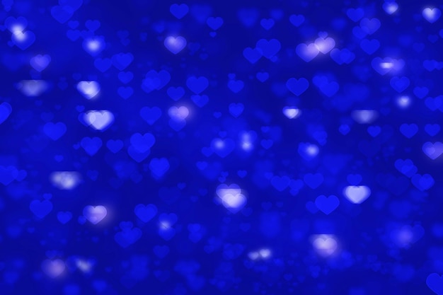 Fond bleu bokeh en forme de coeur pour la carte de voeux ou le papier peint de la saint-valentin