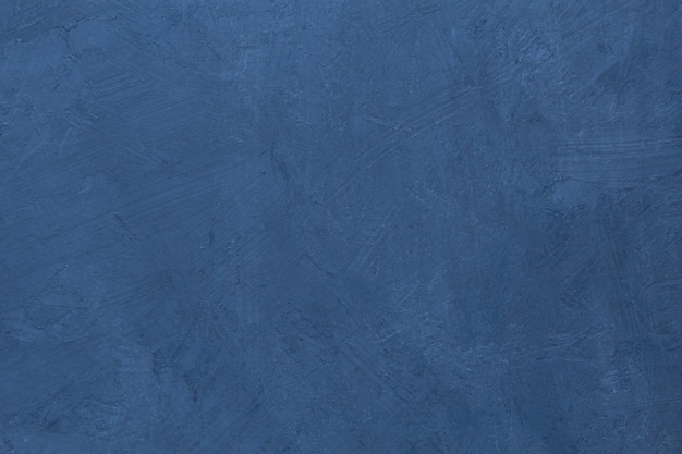 Fond bleu foncé avec la texture de l'ancien mur