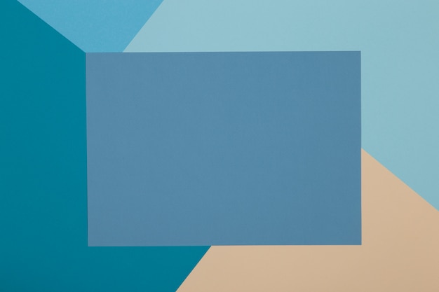Fond bleu et jaune, le papier coloré se divise géométriquement en zones