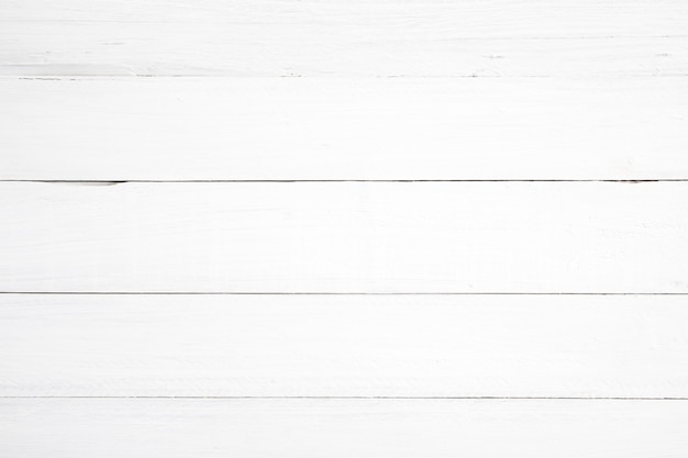 Photo fond de bois blanc propre - planche de bois peint en couleur blanche.