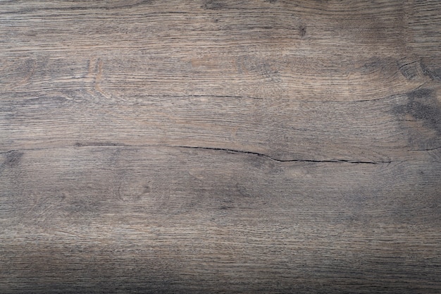 Fond de bois foncé. Texture et motif en bois rustique.