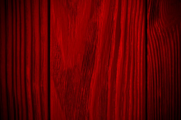 fond en bois texturé rouge avec du noir