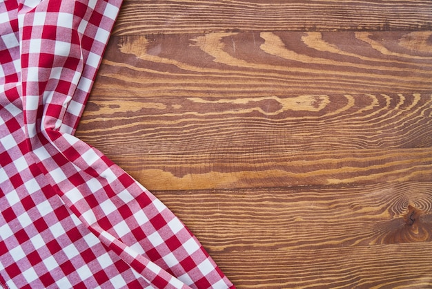 Fond en bois avec tissu à carreaux