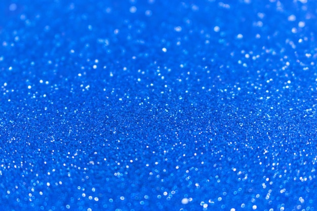 Fond de bokeh bleu brillant défocalisé