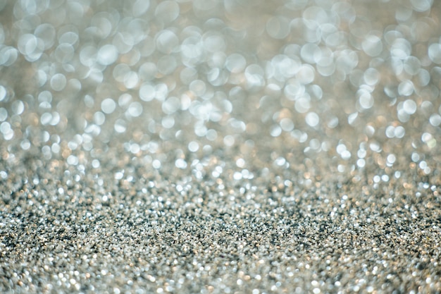 Fond de bokeh flou paillettes argent festives