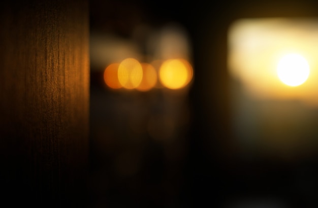 Fond de bokeh intérieur de chambre de fusées de coucher du soleil