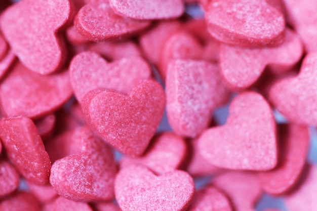 Fond de bonbons roses coeurs pour la Saint-Valentin