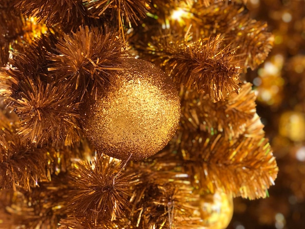 Fond de boule d'or joyeux Noël. Bonne année et Noël 2023