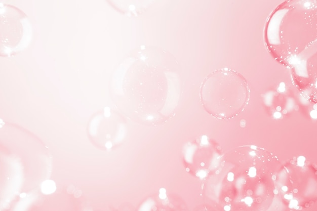 Fond de bulles de savon rose transparent