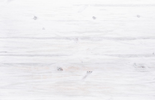 Fond de bureau en bois peint en blanc, table de texture de planche de bois clair clair rustique vierge surface de planche de bois minimal vide propre table simple avec copie espace libre pour le texte, vue de dessus
