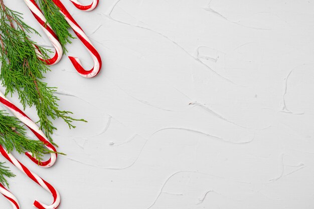 Fond de carte de Noël avec canne en bonbon, espace copie