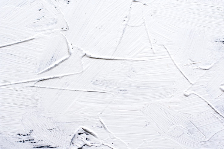 Photo fond de ciment peint en blanc avec de larges coups de pinceau
