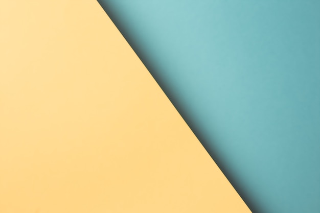 Fond coloré et minimaliste avec des couleurs pastel bleues et jaunes copiez l'espace et un design moderne
