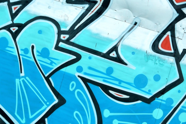 Fond coloré d'œuvres d'art de peinture graffiti avec des bandes aérosol lumineuses et de belles couleurs