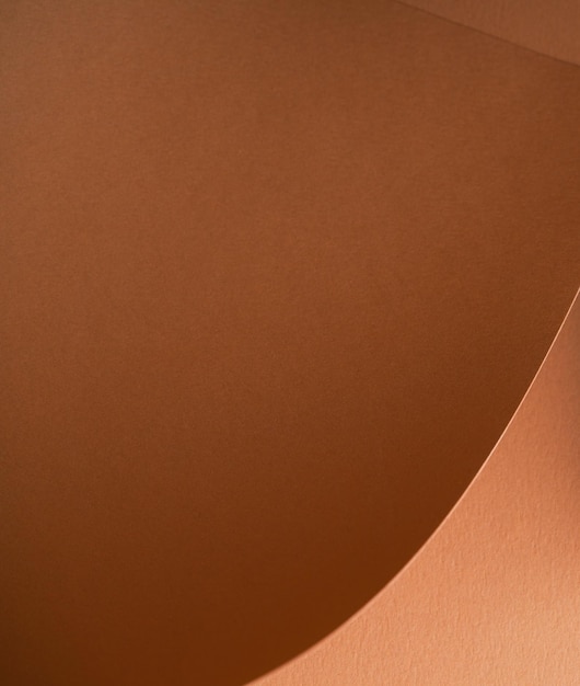 Fond coloré de papier brun avec ombre Géométrique abstrait