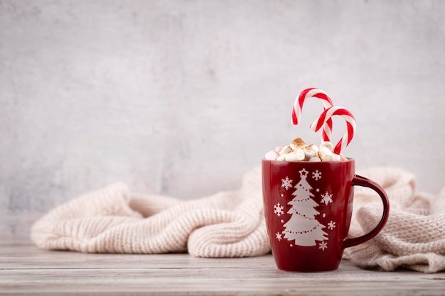 Fond confortable de canne en bonbon de Noël.