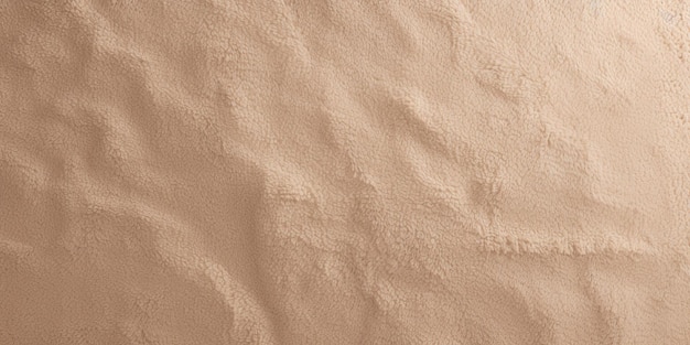 Un fond de couleur beige avec une surface texturée.