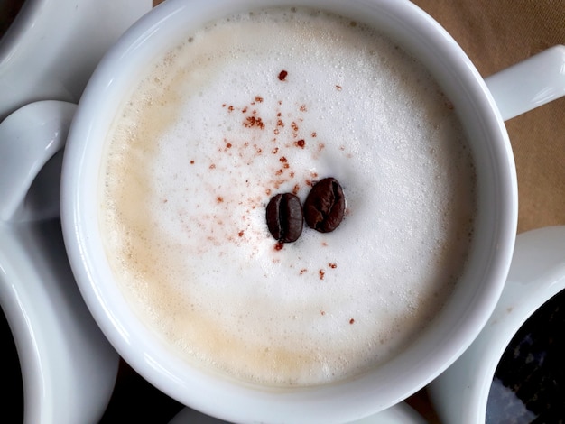 Photo fond avec délicieux capuccino