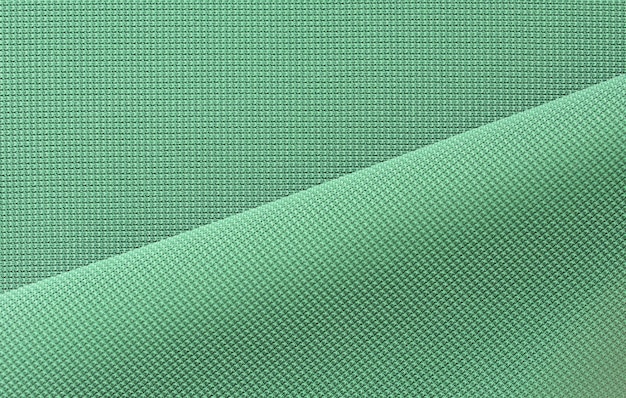 Fond de détail de tissu vert avec espace vide