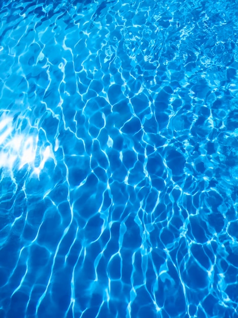 Fond d'eau d'ondulation bleue, piscine bleue de surface de l'eau