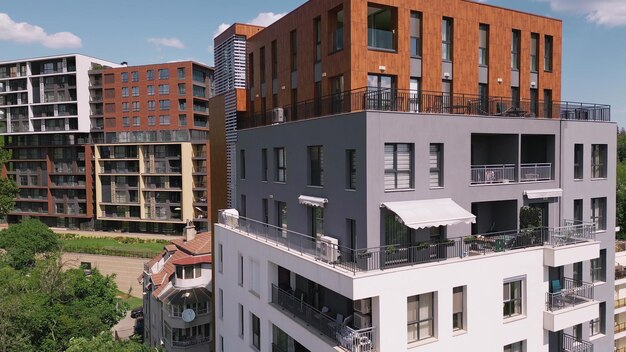 Photo fond de façade de bureau ou de bâtiment résidentiel moderne vol aérien de drone