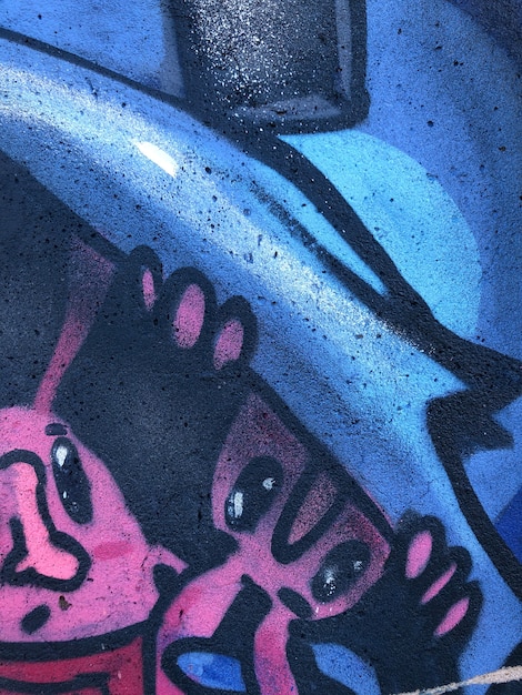 fond graffiti abstrait art de la rue des lignes de dessin colorées et lumineuses sur le mur