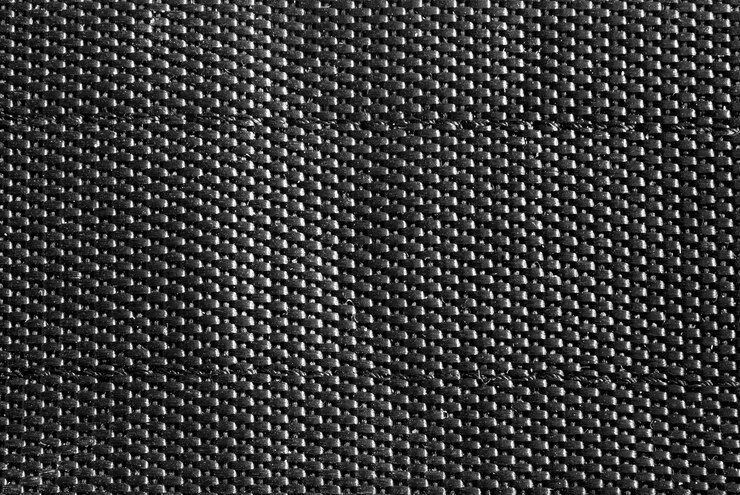 Photo fond gris foncé ou texture de tissu.