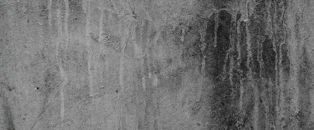 Fond gris grungy de ciment texturé de coup de pinceau naturel ou de pierre ancienne. texture béton comme un mur de modèle rétro conceptuel.