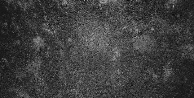 Fond grunge noir foncé et texture du mur de béton noir