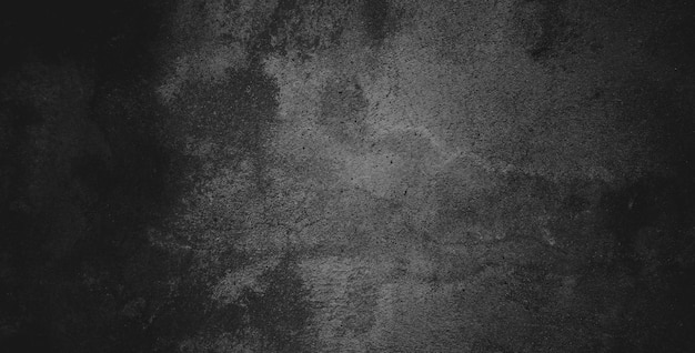 Fond grunge noir foncé et texture du mur de béton noir