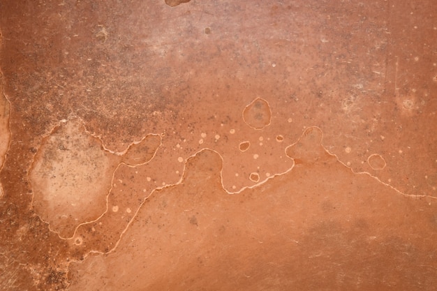 Fond marron texturé et vieux fer. Espace de copie