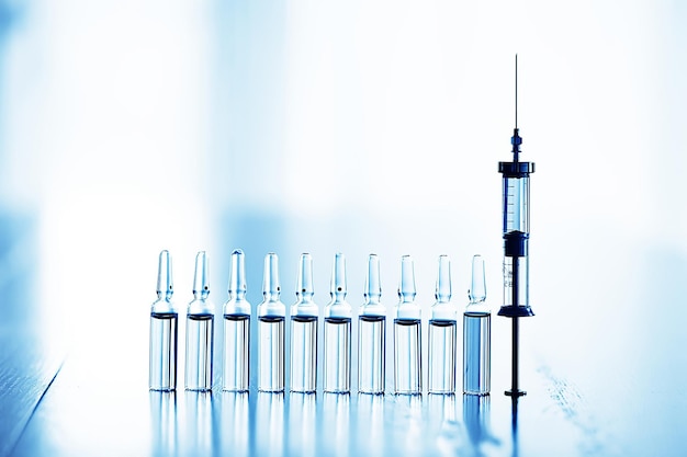 fond de médecine abstraite de seringue, vaccin, protection contre les virus d'injection