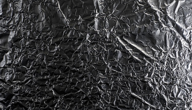 Fond métallique à texture de feuille noire