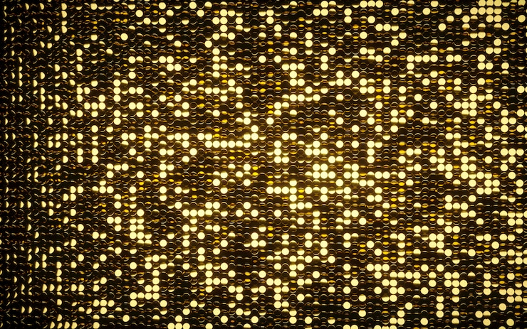 Photo fond de mosaïque brillante de pièces d&#39;or.