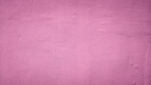 fond de mur en béton de ciment de texture abstraite rose