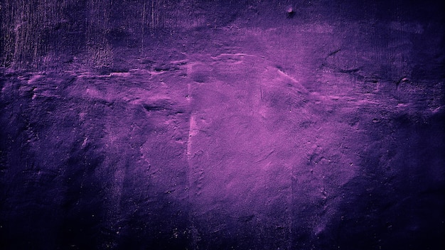 fond de mur en béton de ciment de texture abstraite violet foncé