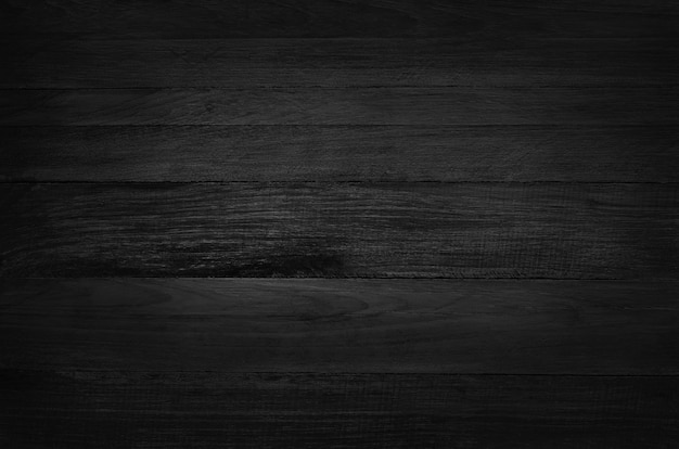 Fond de mur en bois noir, texture du bois d'écorce sombre, vue de dessus du bois de grain.