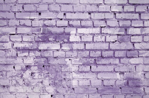 Fond de mur de brique carrée et texture. Peint en violet