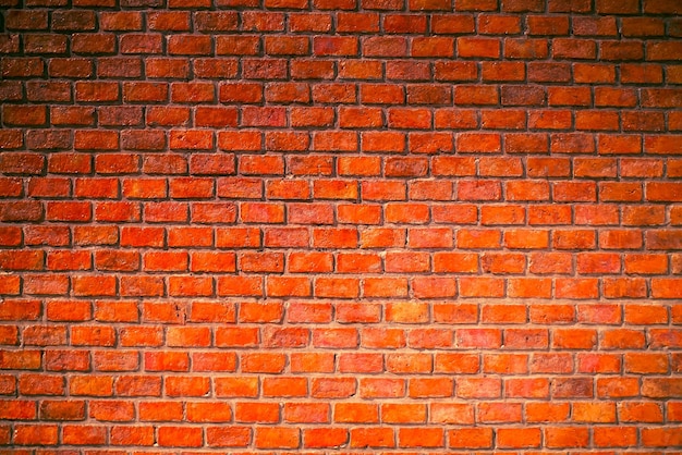 Fond de mur de brique orange sans soudure fond de mur de brique orange grunge