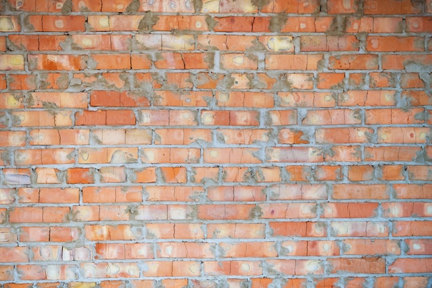 Fond d'un mur de brique orange