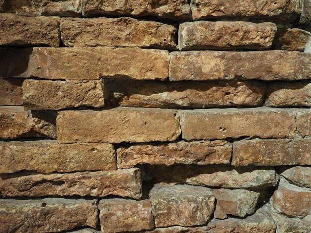 Fond de mur de brique rouge